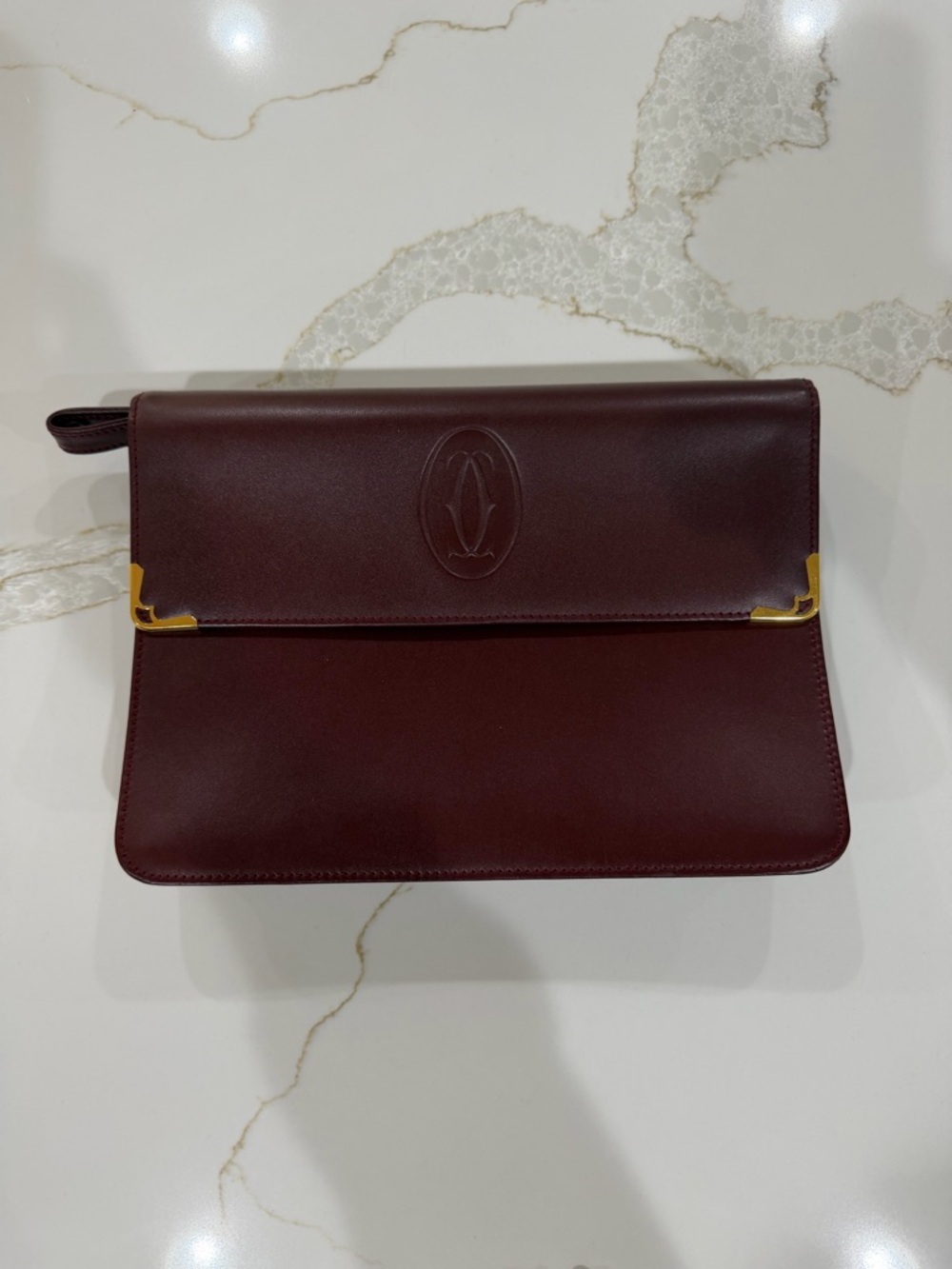 Cartier Burgundy Leather Fold-Over Clutch with Gold Corners